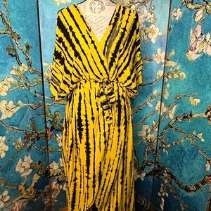 100% rayon, tiger striped, one size fits all kimono style robe. ￼